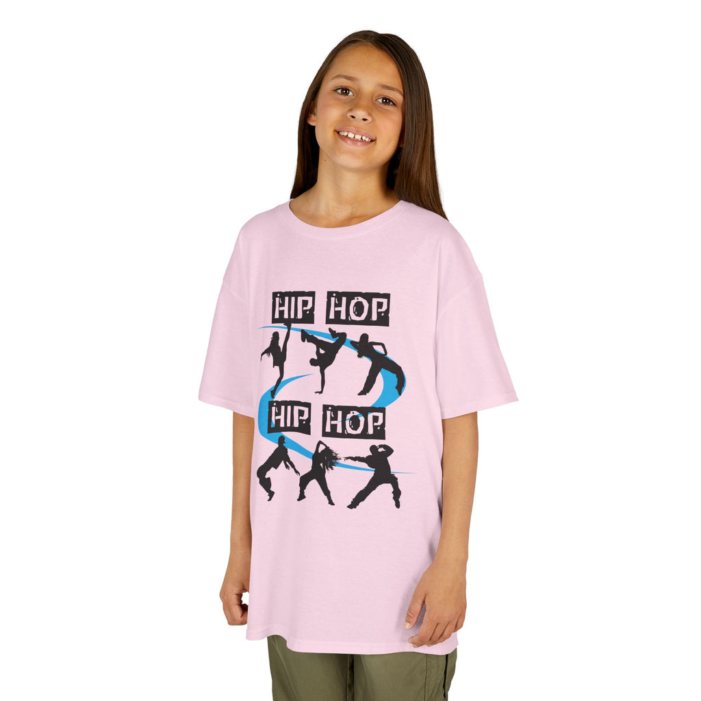Young girl wearing a youth Gildan 5000B heavy cotton t-shirt in light pink with a Hip Hop text and dancers