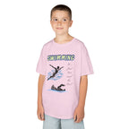 Young boy wearing a youth Gildan 5000B heavy cotton t-shirt in light pink with a Swimming text and graphic