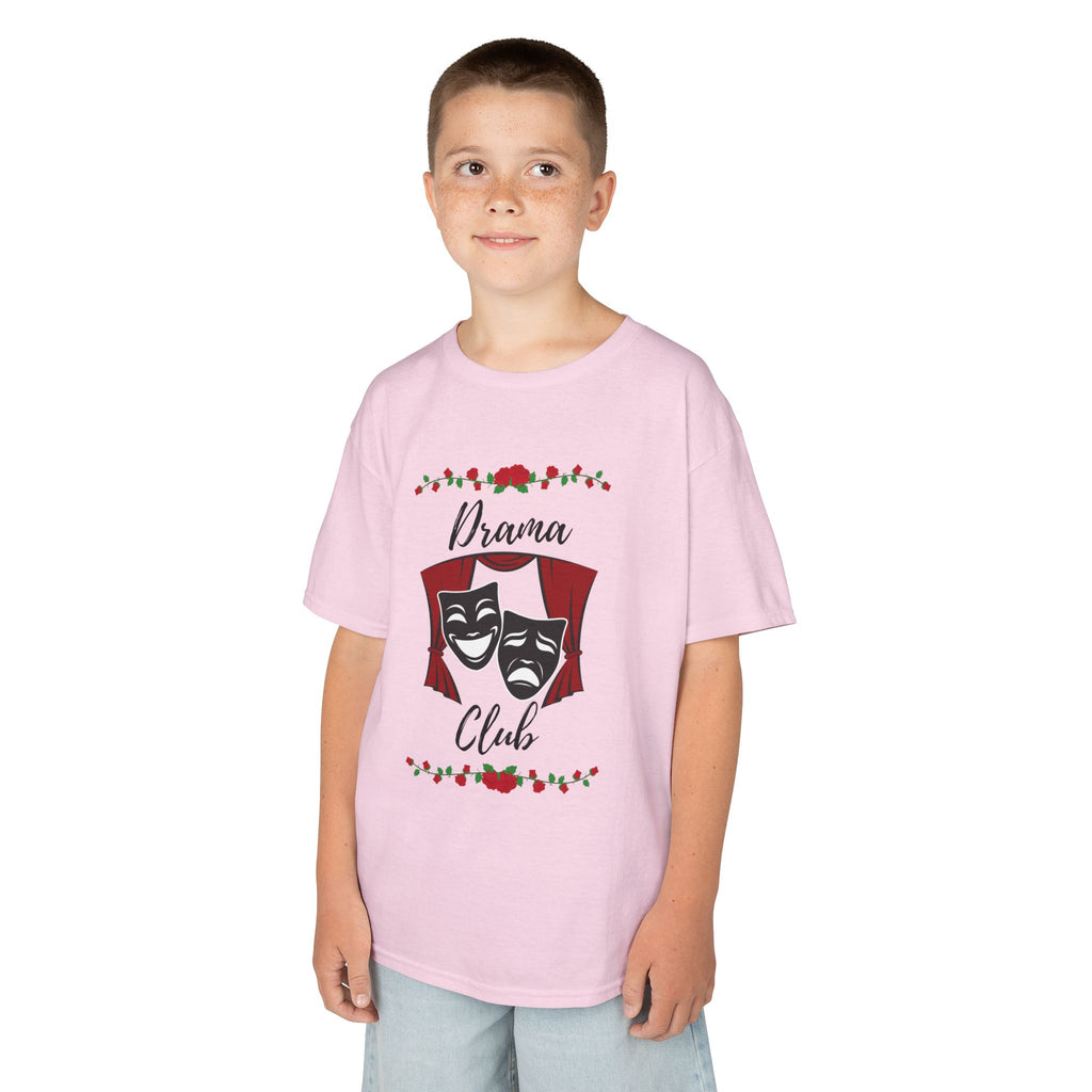 Young boy wearing a youth Gildan 5000B heavy cotton t-shirt in light pink with a Drama Club text and graphic 