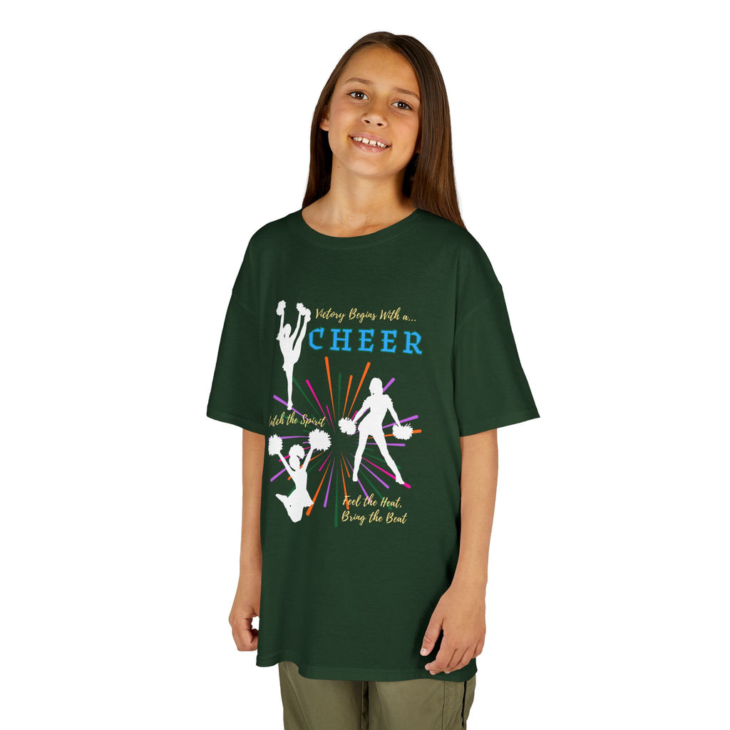 Young girl wearing a youth Gildan 5000B heavy cotton t-shirt in forest with a Cheer Team design