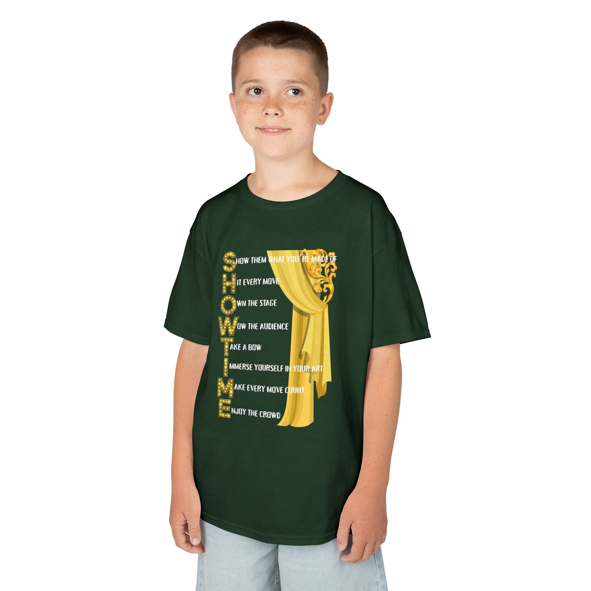 Young boy wearing a youth Gildan 5000B heavy cotton t-shirt in forest green with a Showtime text and graphic 