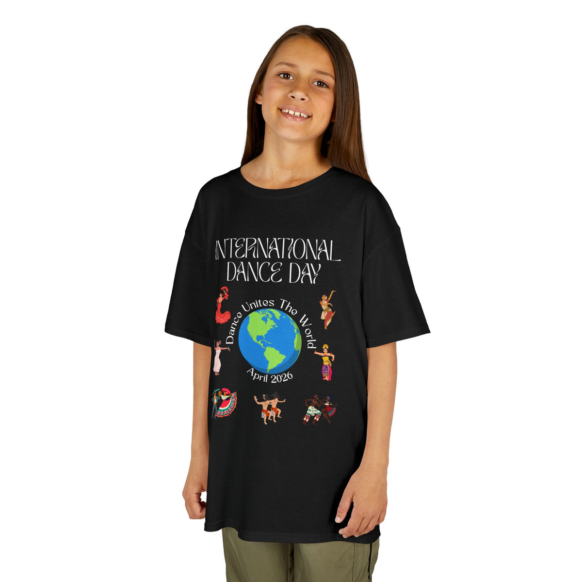 Young girl wearing a youth Gildan 5000B heavy cotton t-shirt in black with an International Dance Day theme 