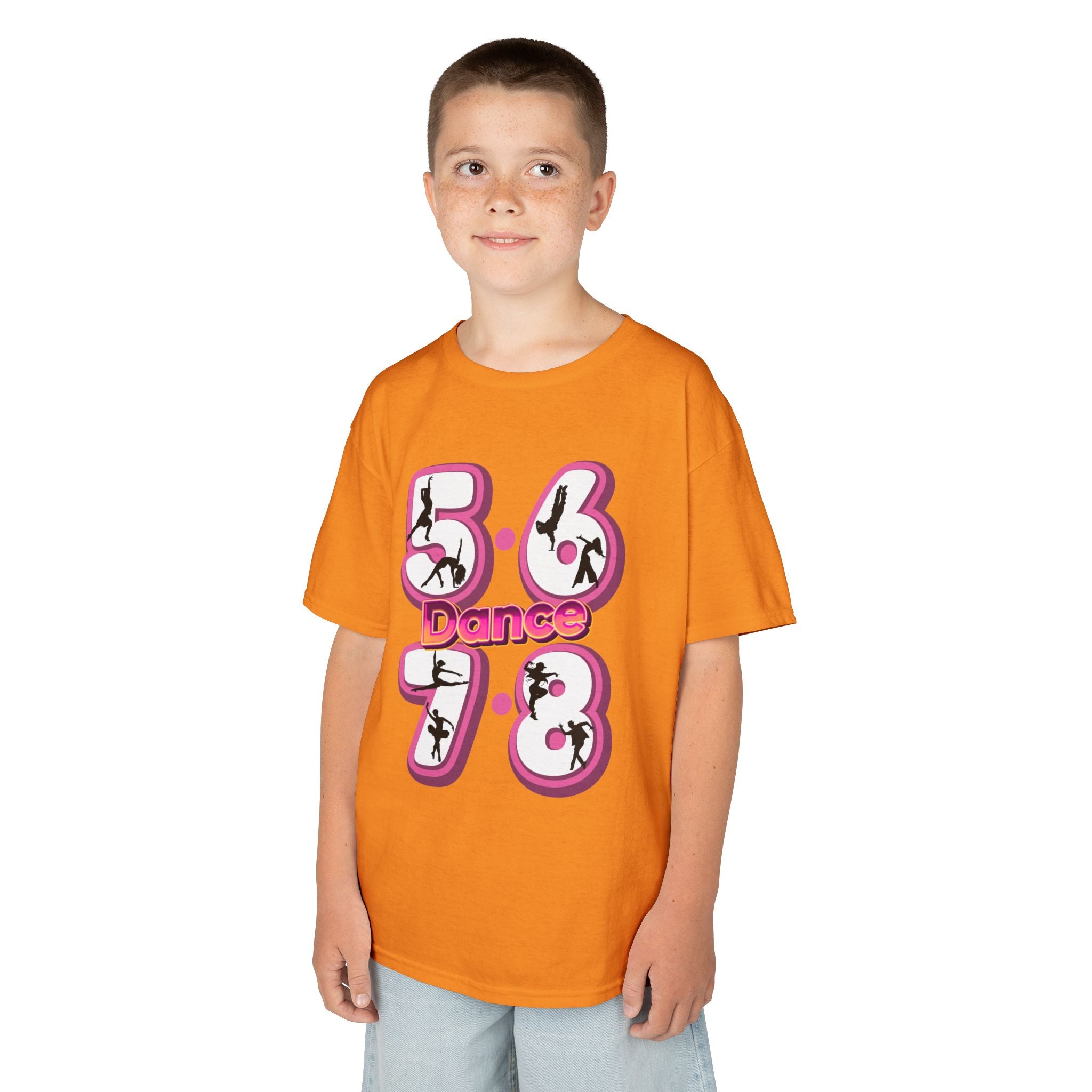 Young boy wearing a Gildan 5000B heavy cotton t-shirt in tennessee orange with a 5678 Dance text and graphic