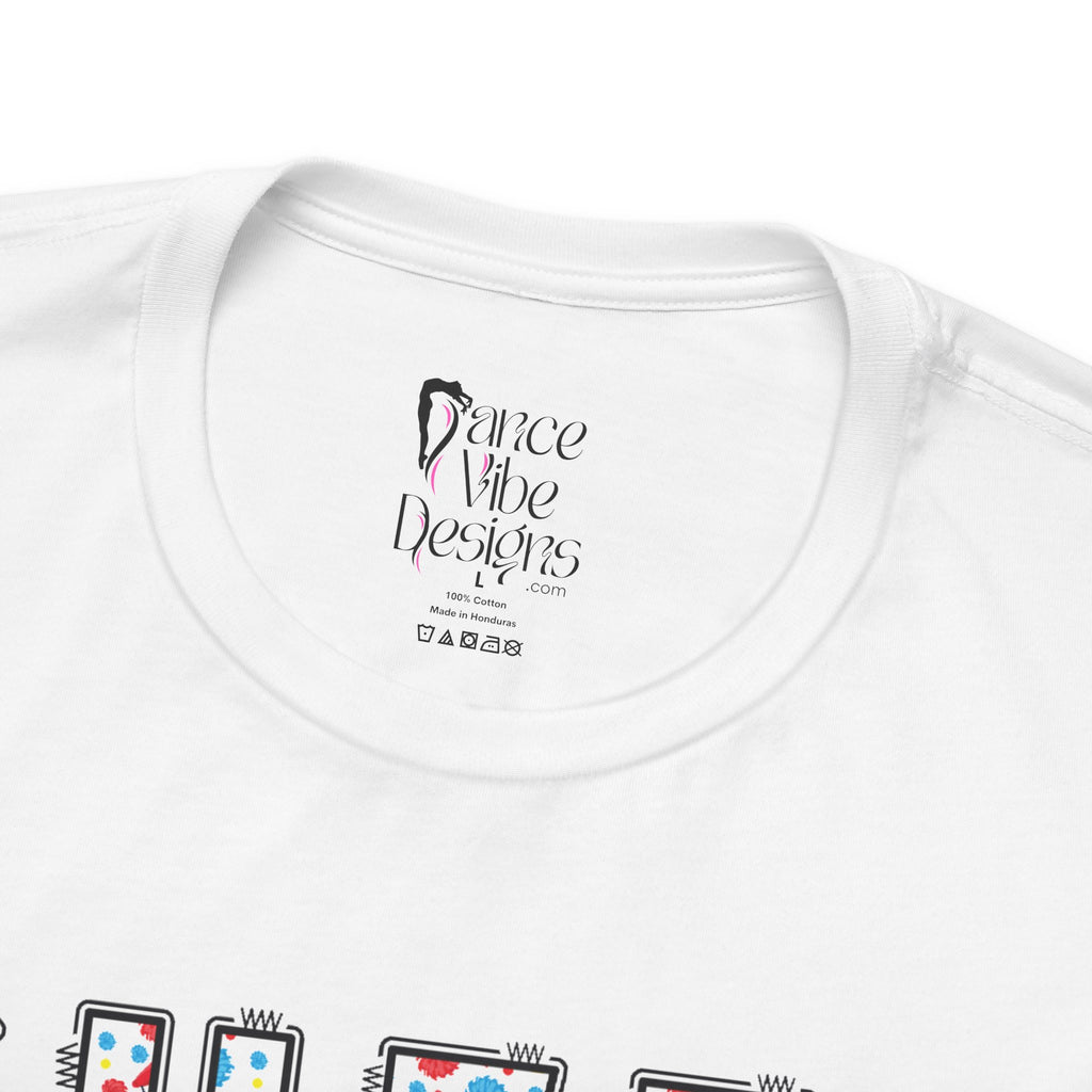 Close-up of a t-shirt's inner neck label with the brand Dance Vibe Designs printed above the care instructions.