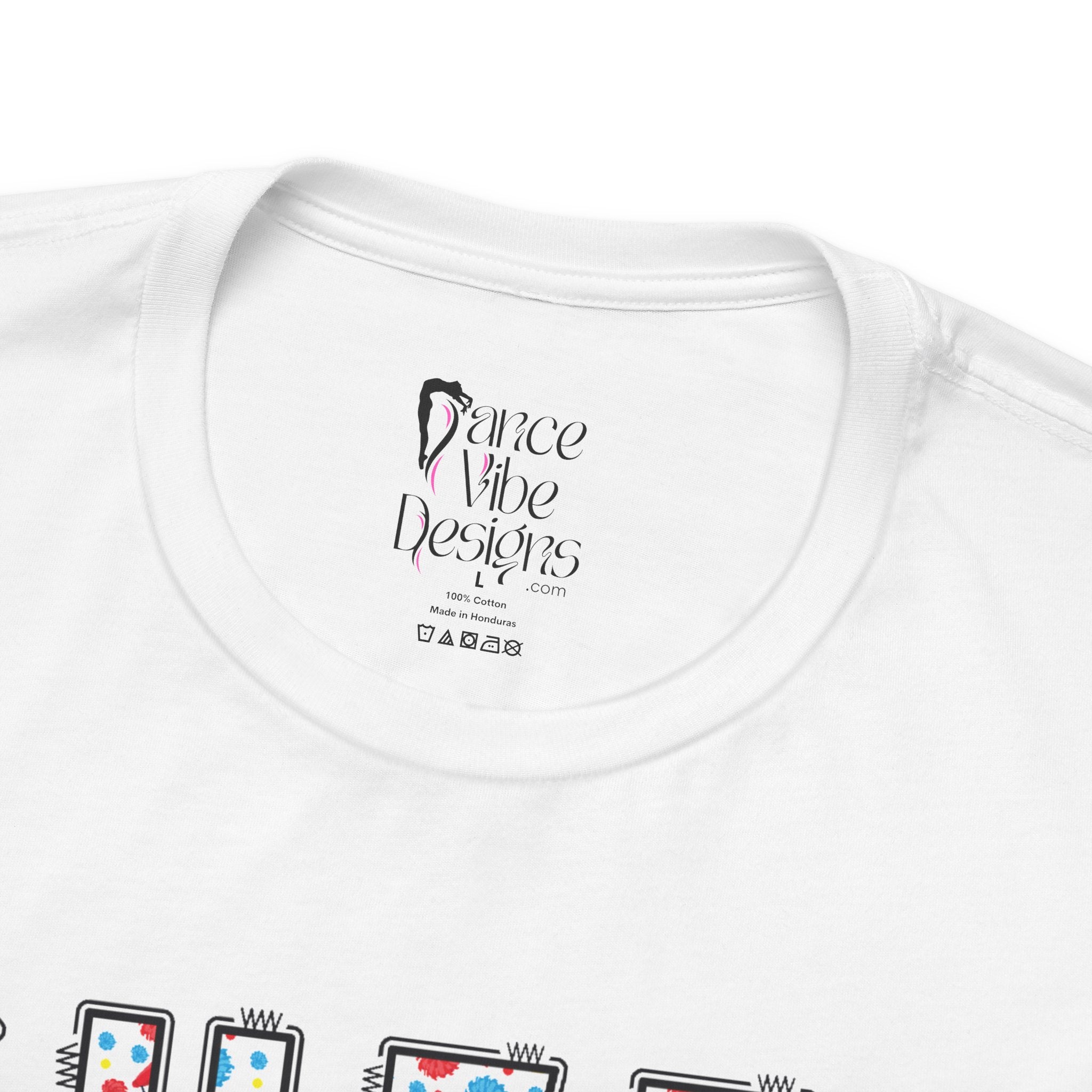 Close-up of a t-shirt's inner neck label with the brand Dance Vibe Designs printed above the care instructions.