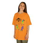 Young girl wearing a youth Gildan 5000B heavy cotton t-shirt in tennessee orange with a Softball text and graphic