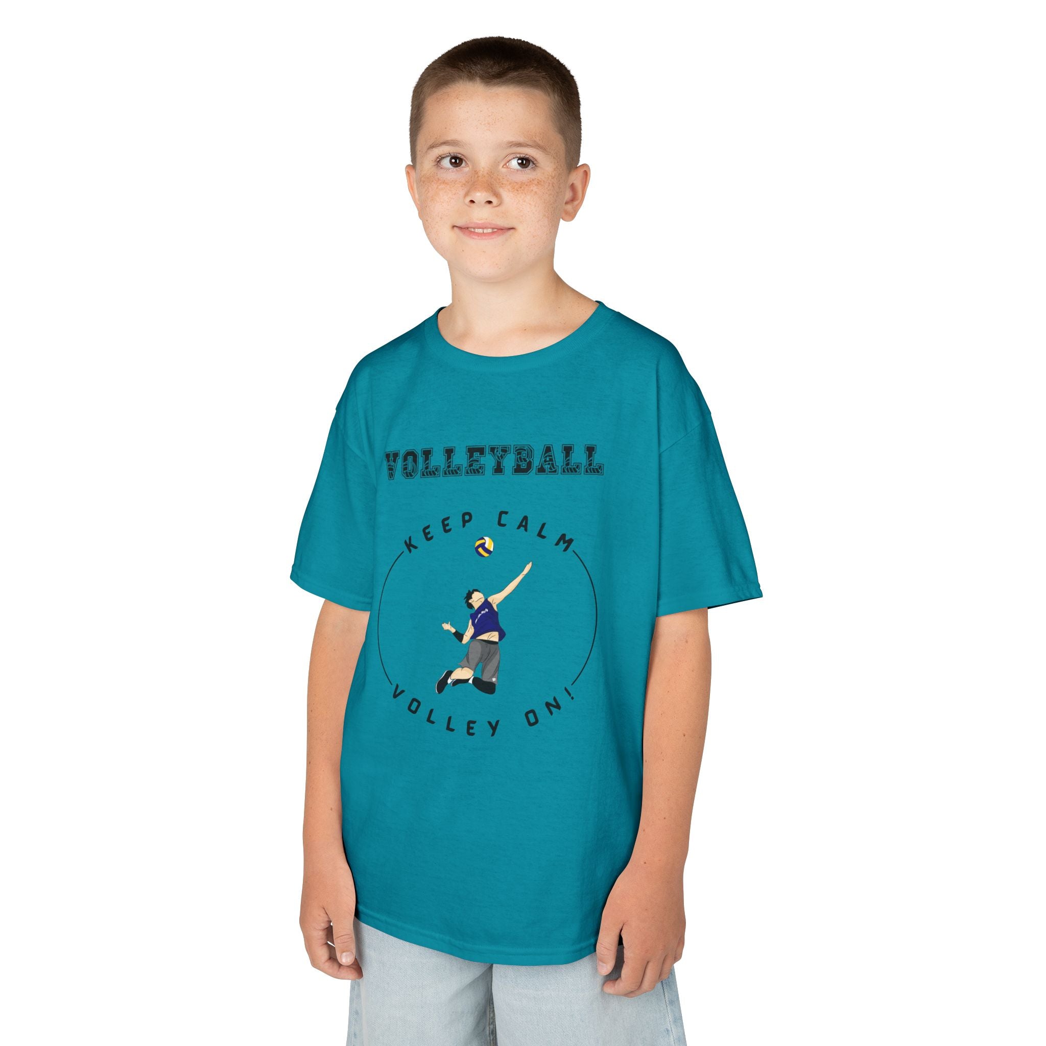 Young boy wearing a youth Gildan 5000B heavy cotton t-shirt in tropical blue showing a boy playing Volleyball