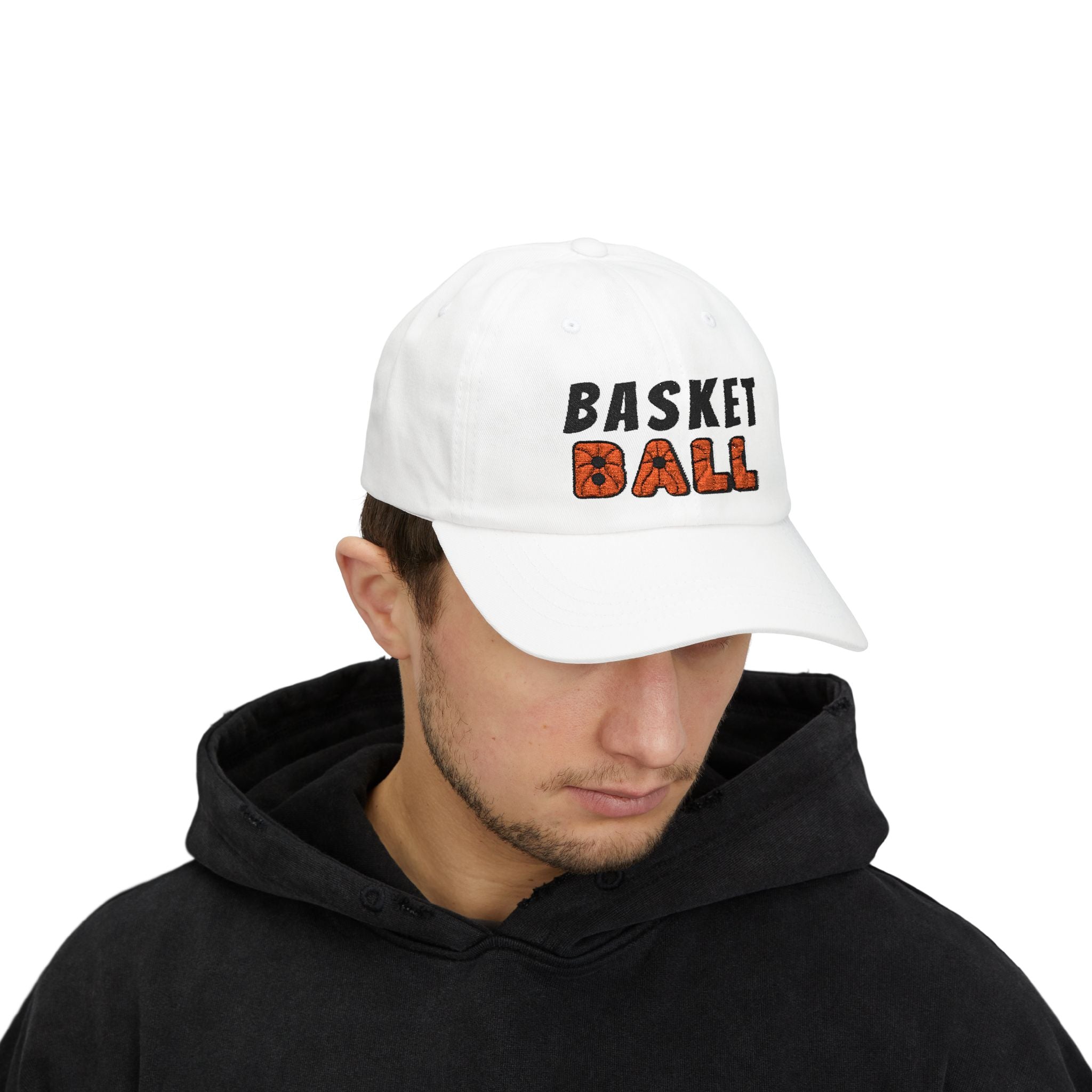 Man wearing a white embroidered classic dad cap hat with Basketball text and graphic