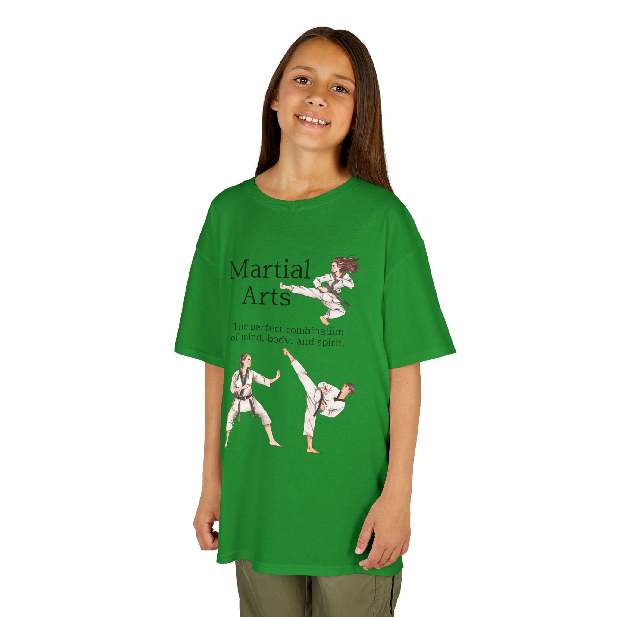 Young girl wearing a youth Gildan 5000B heavy cotton t-shirt in irish green with a Martial Arts text and graphic