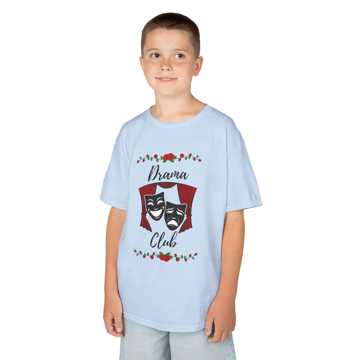 Young boy wearing a youth Gildan 5000B heavy cotton t-shirt in light blue with a Drama Club text and graphic 
