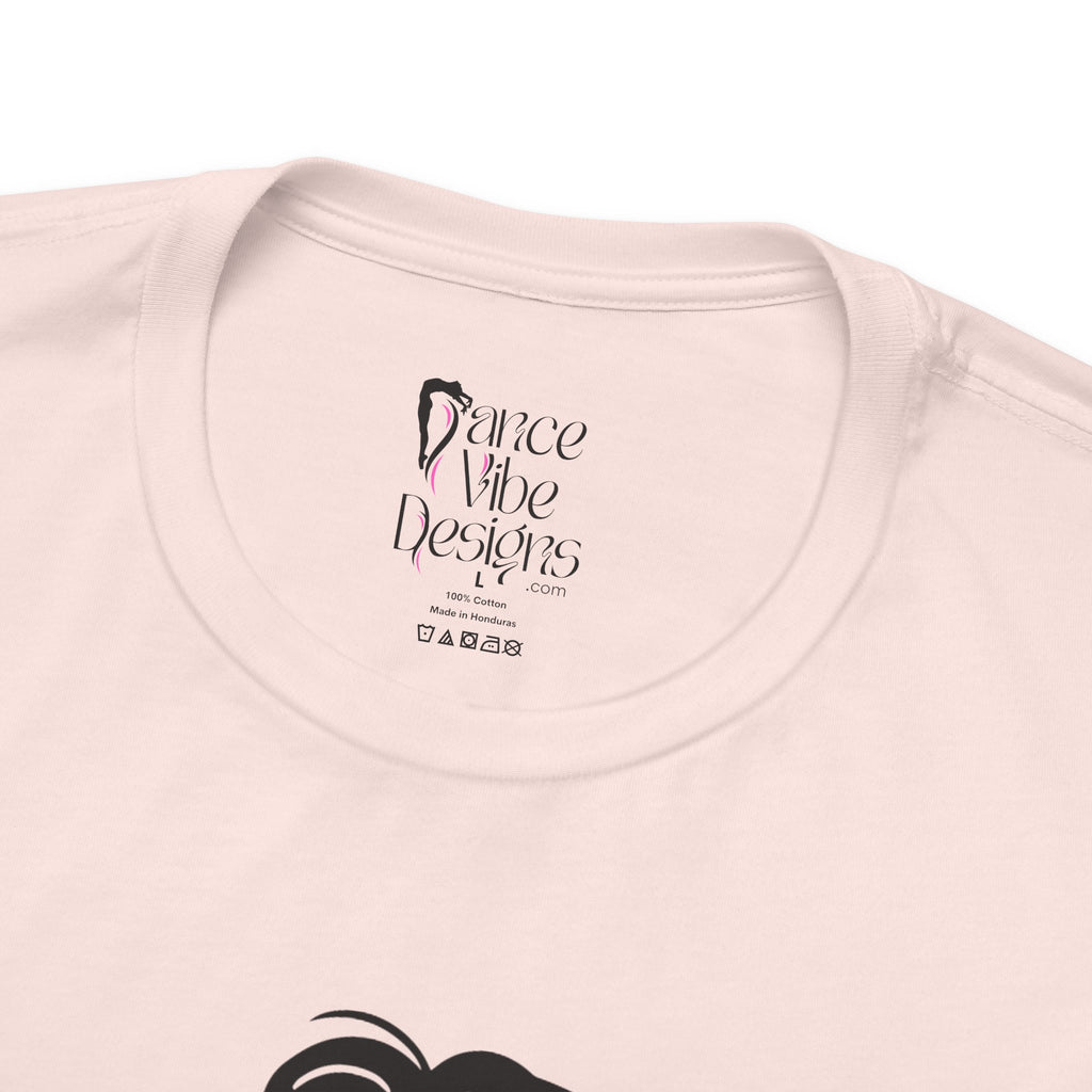 Close-up of a t-shirt's inner neck label with the brand Dance Vibe Designs showing above the care instructions.