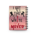 Back cover of a spiral-bound notebook with a pink and peach gradient cover featuring the text 'I GOT THE WRITE MOVES' in black and red, along with black silhouettes of two hip hop dancers.