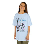 Young girl wearing a youth Gildan 5000B heavy cotton t-shirt in light blue with a Cheer Team design
