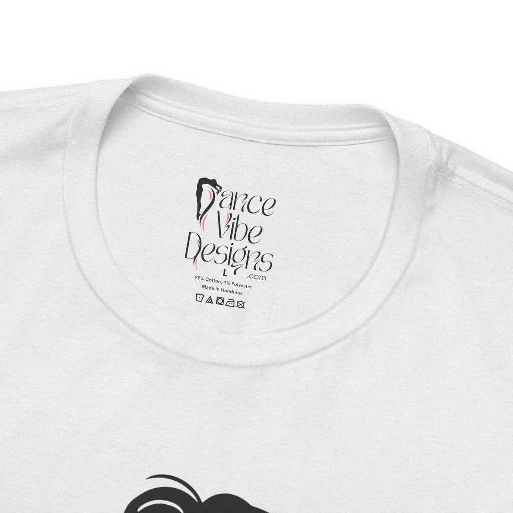 Close-up of a t-shirt's inner neck label with the brand Dance Vibe Designs showing above the care instructions.