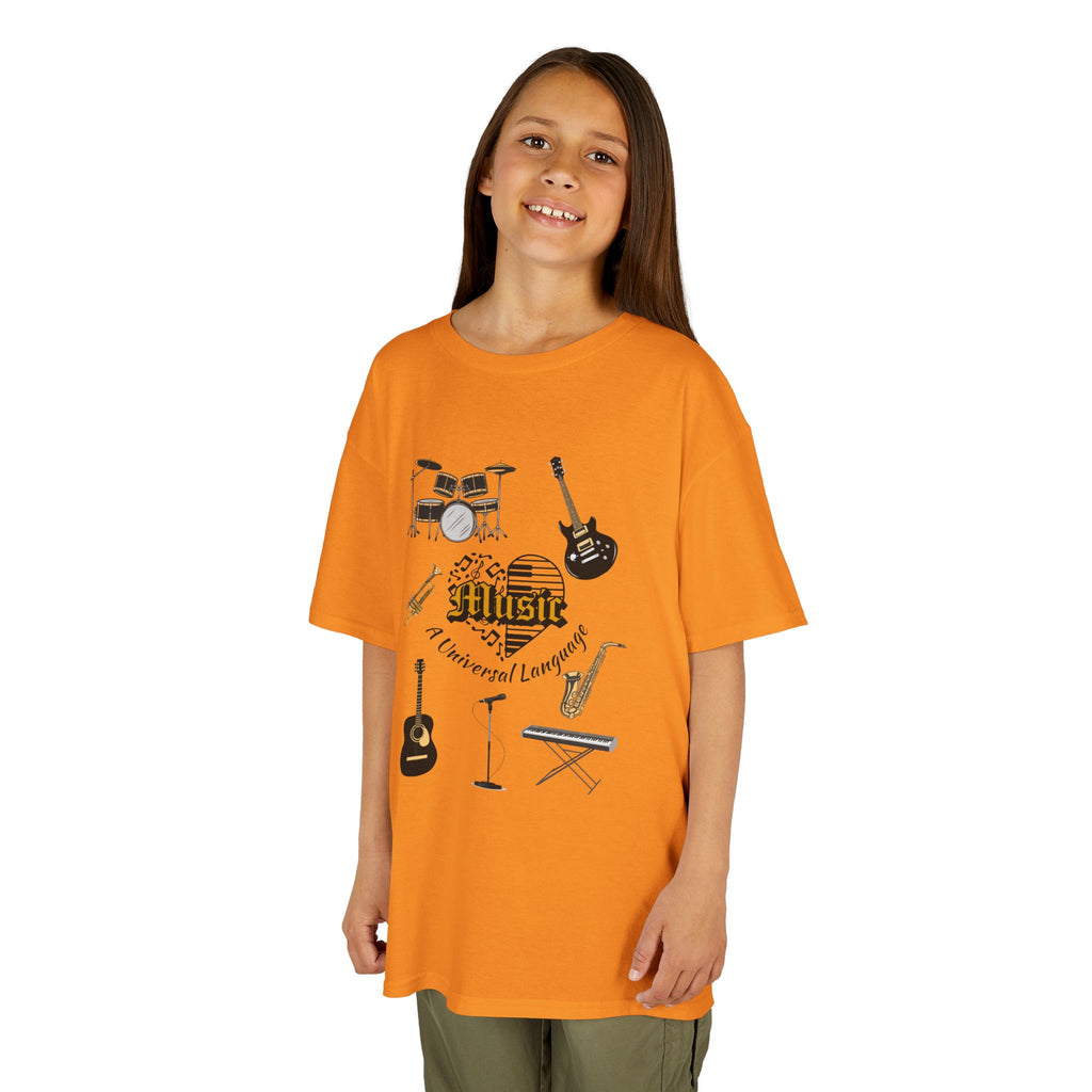 Young girl wearing a youth Gildan 5000B heavy cotton t-shirt in tennessee orange with a Music A Universal Language theme