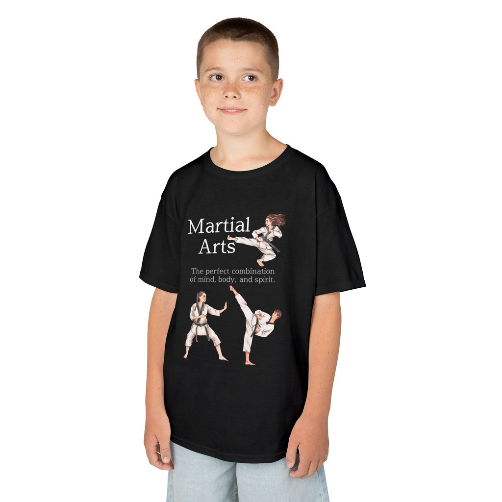 Young boy wearing a youth Gildan 5000B heavy cotton t-shirt in black with a Martial Arts text and graphic