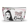 Makeup bag with a face design and 'Stage Ready' text on a white background with a black zipper