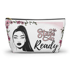 Makeup bag with a face design and 'Stage Ready' text on a white background with a black zipper