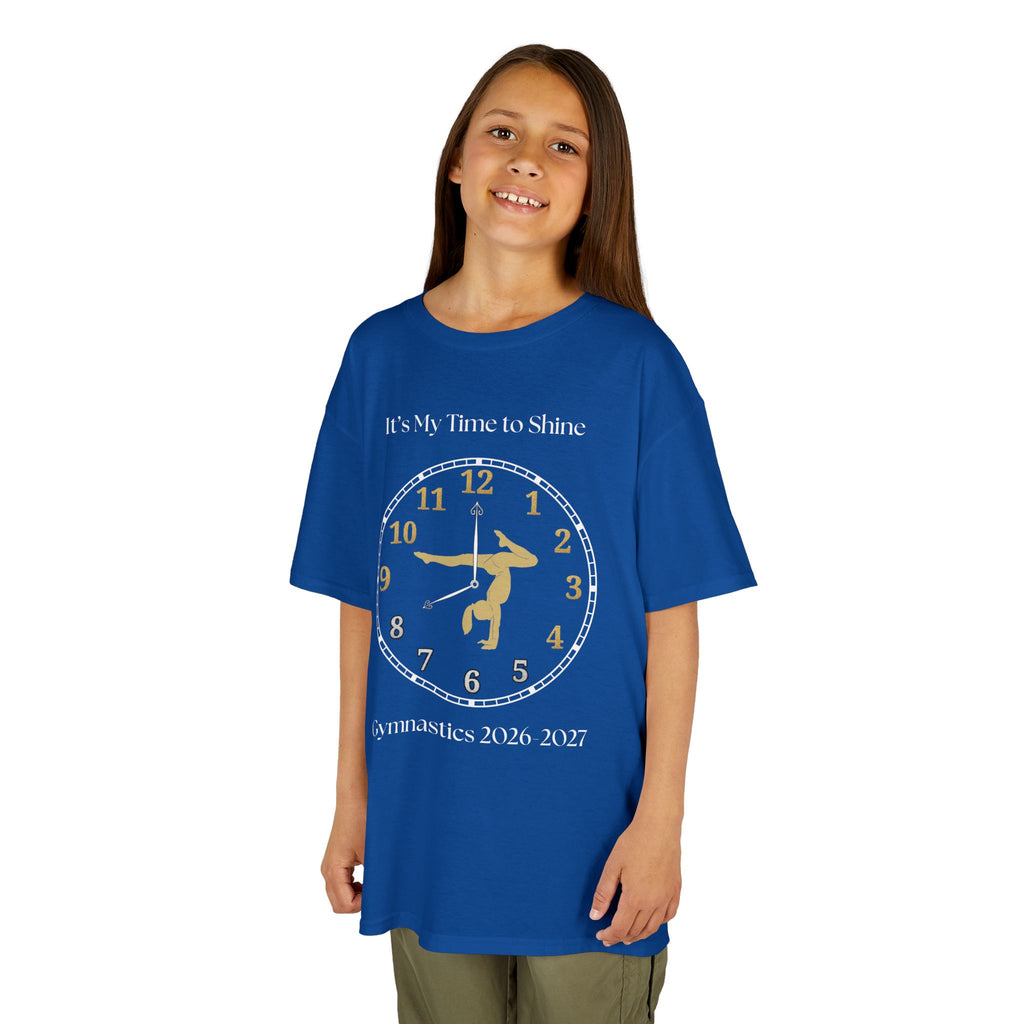 Young girl wearing a youth Gildan 5000B heavy cotton t-shirt in royal with an It's My Time to Shine Gymnastics 2026-2027 theme