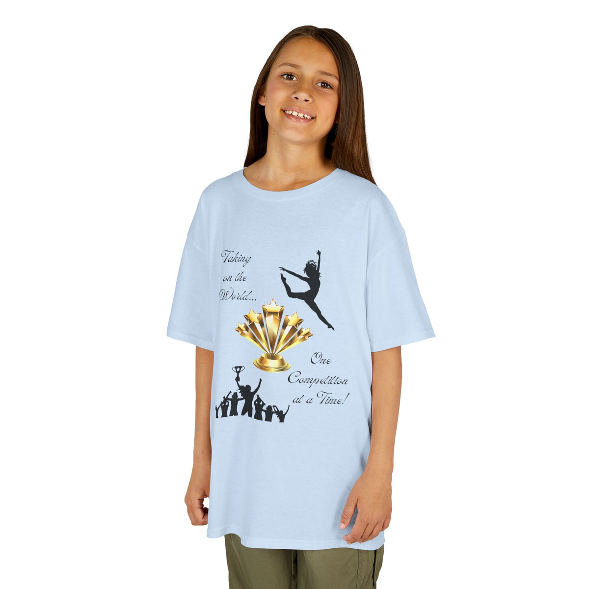 Young girl wearing a youth Gildan 5000B heavy cotton t-shirt in light blue with a Dance Competition theme