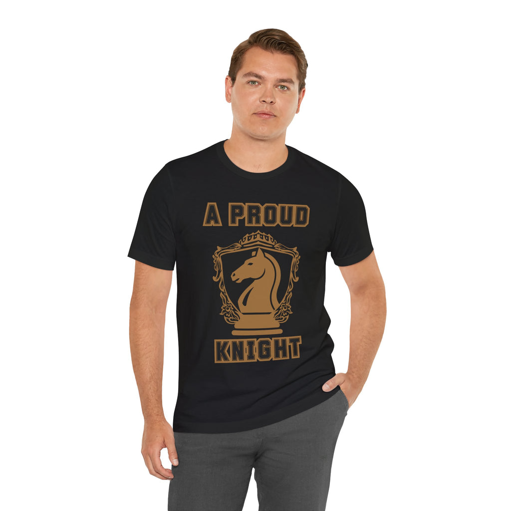 Man wearing a black graphic T-shirt with a gold chess knight design and the words A PROUD KNIGHT on the front.