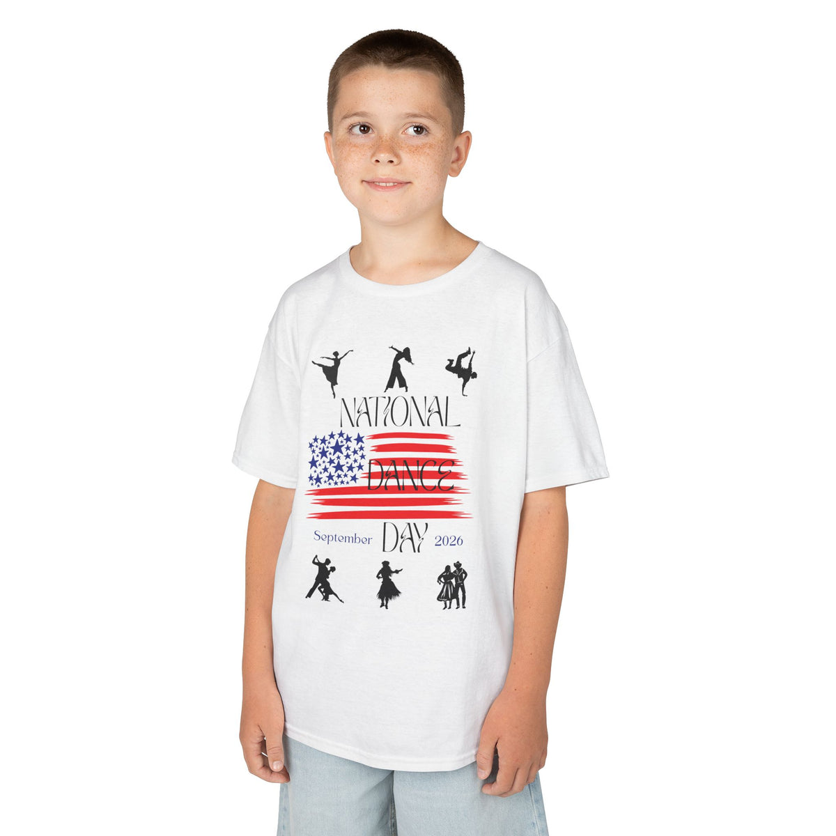 Young boy wearing a youth Gildan 5000B heavy cotton t-shirt in white with a National Dance Day theme