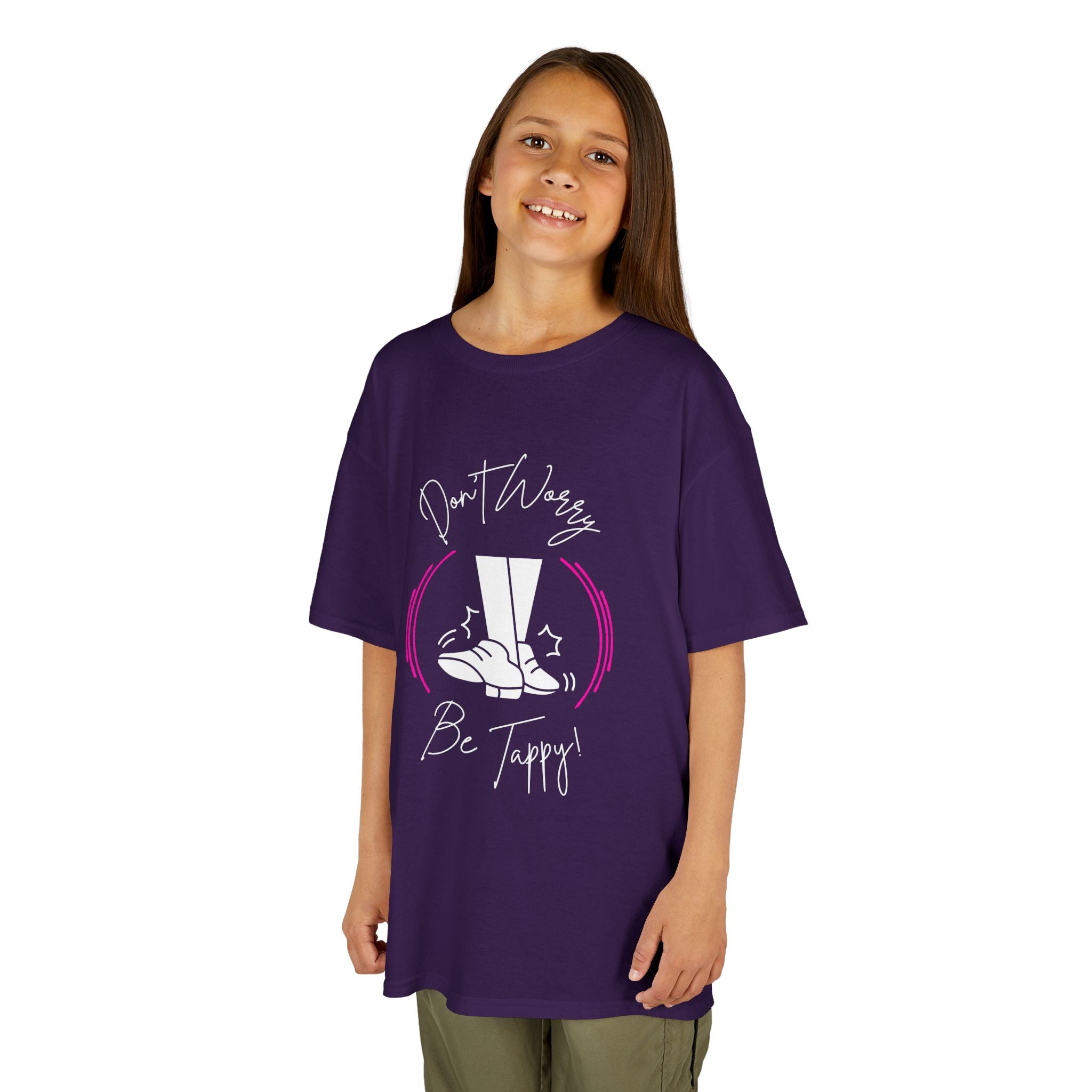 Young girl wearing a youth Gildan 5000B heavy cotton t-shirt in purple with a Don't Worry Be Tappy Tap Shoe design