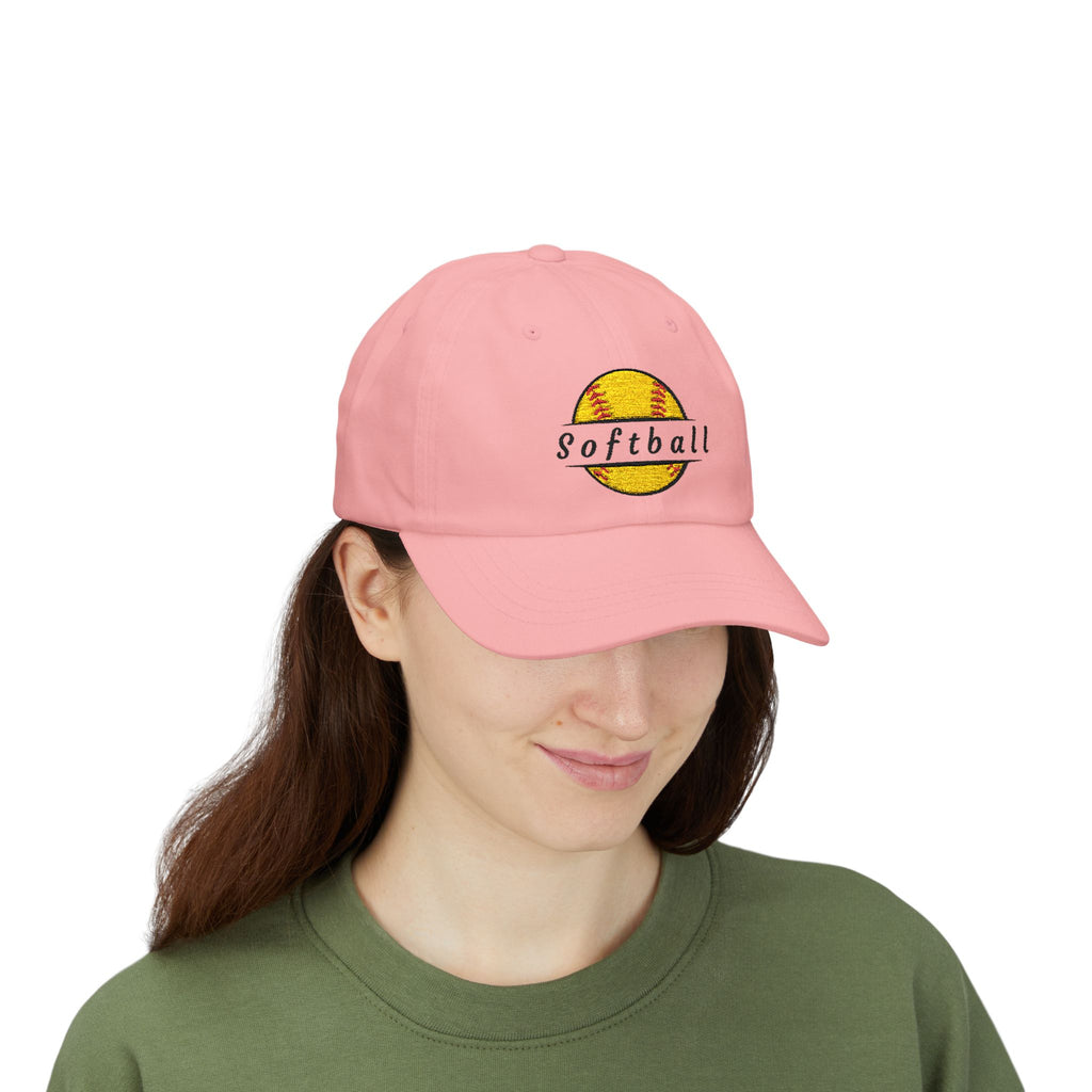 Woman wearing a pink embroidered classic dad cap hat with a Softball text and graphic