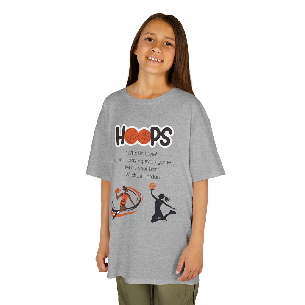 Young girl wearing a youth Gildan 5000B heavy cotton t-shirt in sport grey featuring a Girls Basketball design
