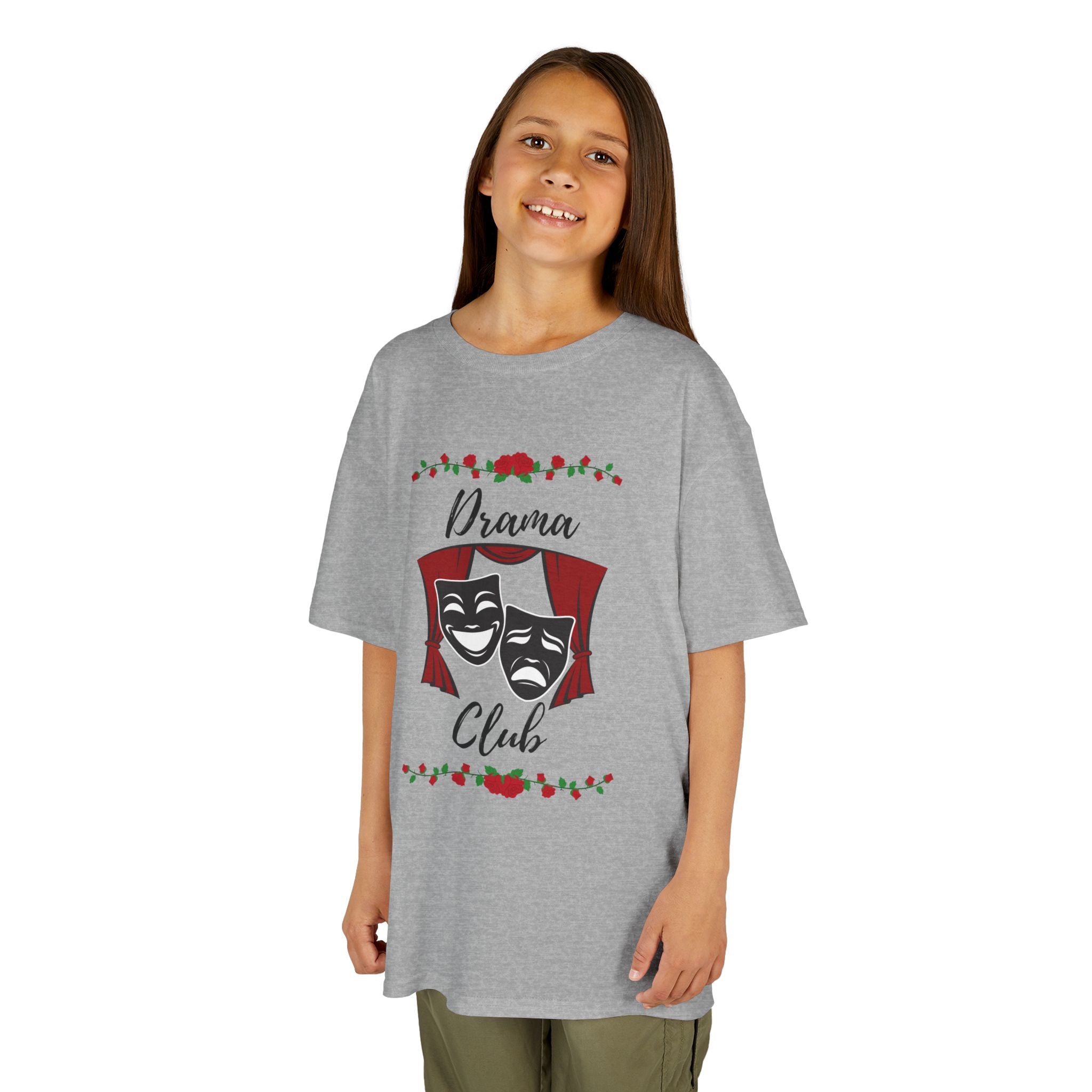 Young girl wearing a youth Gildan 5000B heavy cotton t-shirt in sport grey with a Drama Club text and graphic 