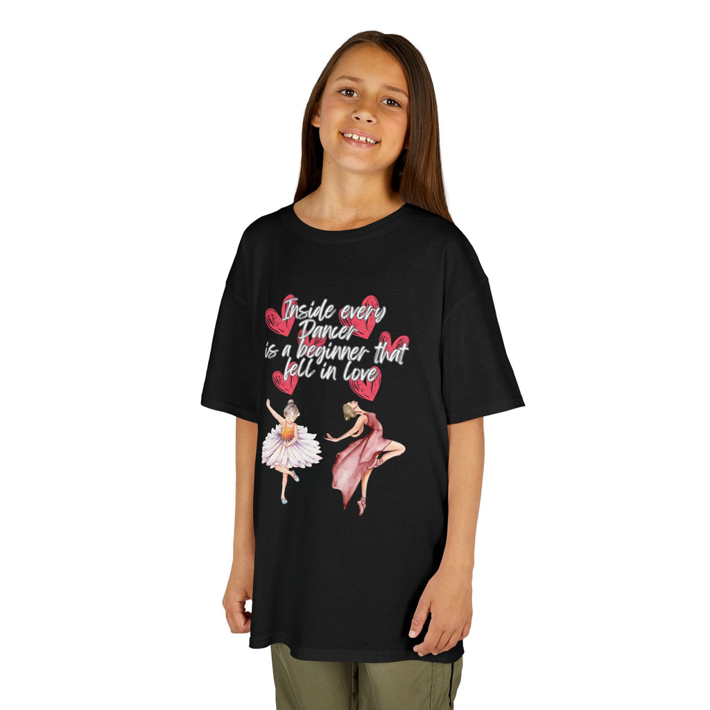 Young girl wearing a youth Gildan 5000B heavy cotton t-shirt in black with an Inside Every Dancer is a Beginner that Fell in Love theme