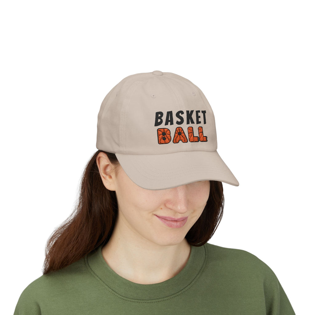Woman wearing a stone embroidered classic dad cap hat with Basketball text and graphic
