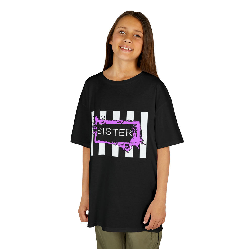 A young girl wearing a black Beetlejuice inspired Sister Halloween shirt.