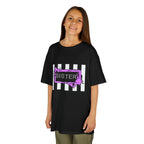 A young girl wearing a black Beetlejuice inspired Sister Halloween shirt.