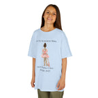 Young girl wearing a youth Gildan 5000B heavy cotton t-shirt in light blue with a First Dance Class theme