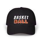 A black baseball cap featuring BASKET BALL embroidered on the front, with BASKET in white and BALL in orange. 