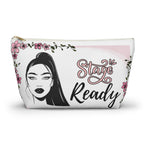 Makeup bag with a face design and 'Stage Ready' text on a white background white zipper