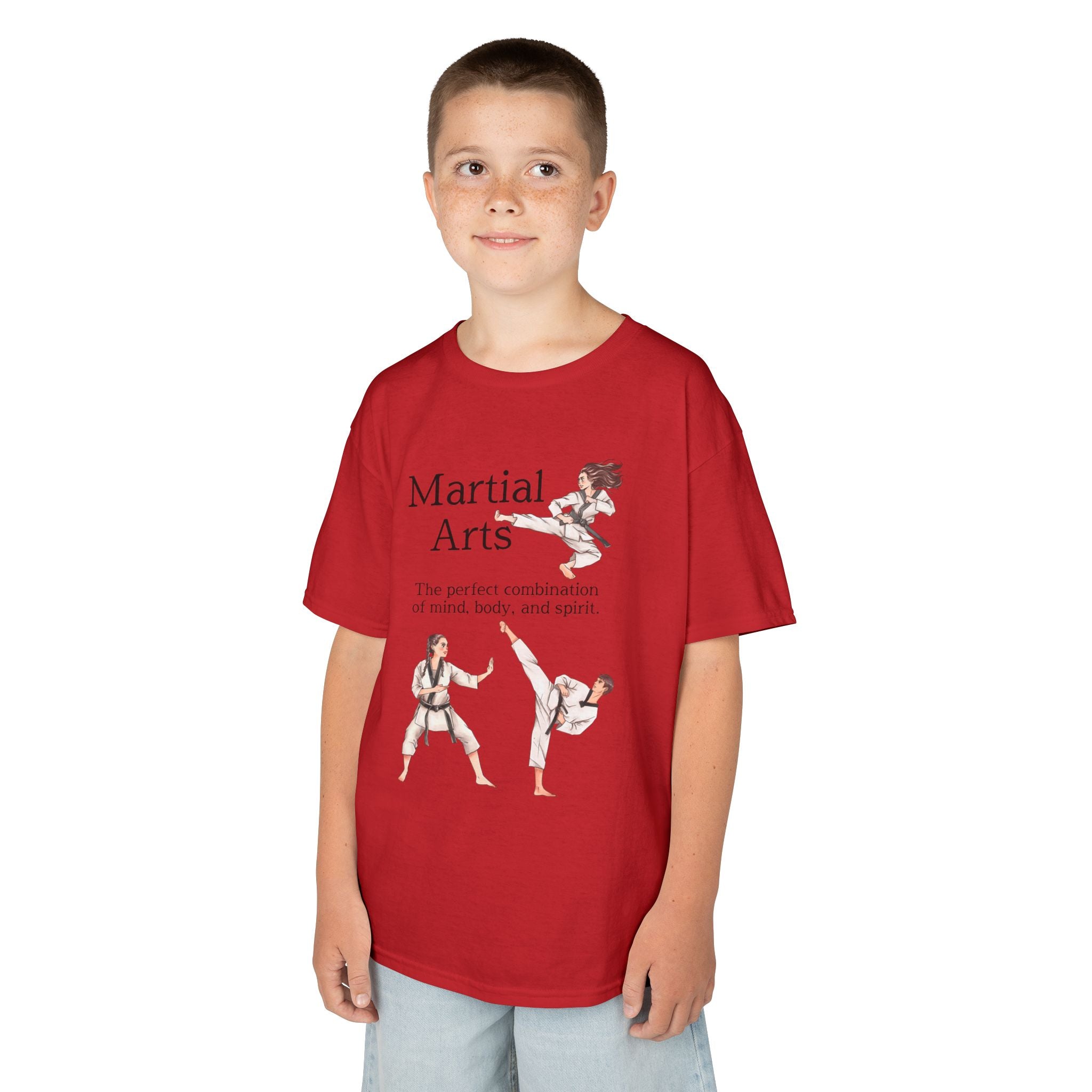Young boy wearing a youth Gildan 5000B heavy cotton t-shirt in red with a Martial Arts text and graphic