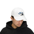 Man wearing a white embroidered classic dad cap hat with a Swim text and graphic