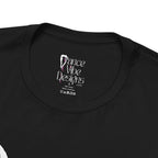 Close-up of a crewneck t-shirt showing the inner neck label with the brand Dance Vibe Designs printed above the care instructions.
