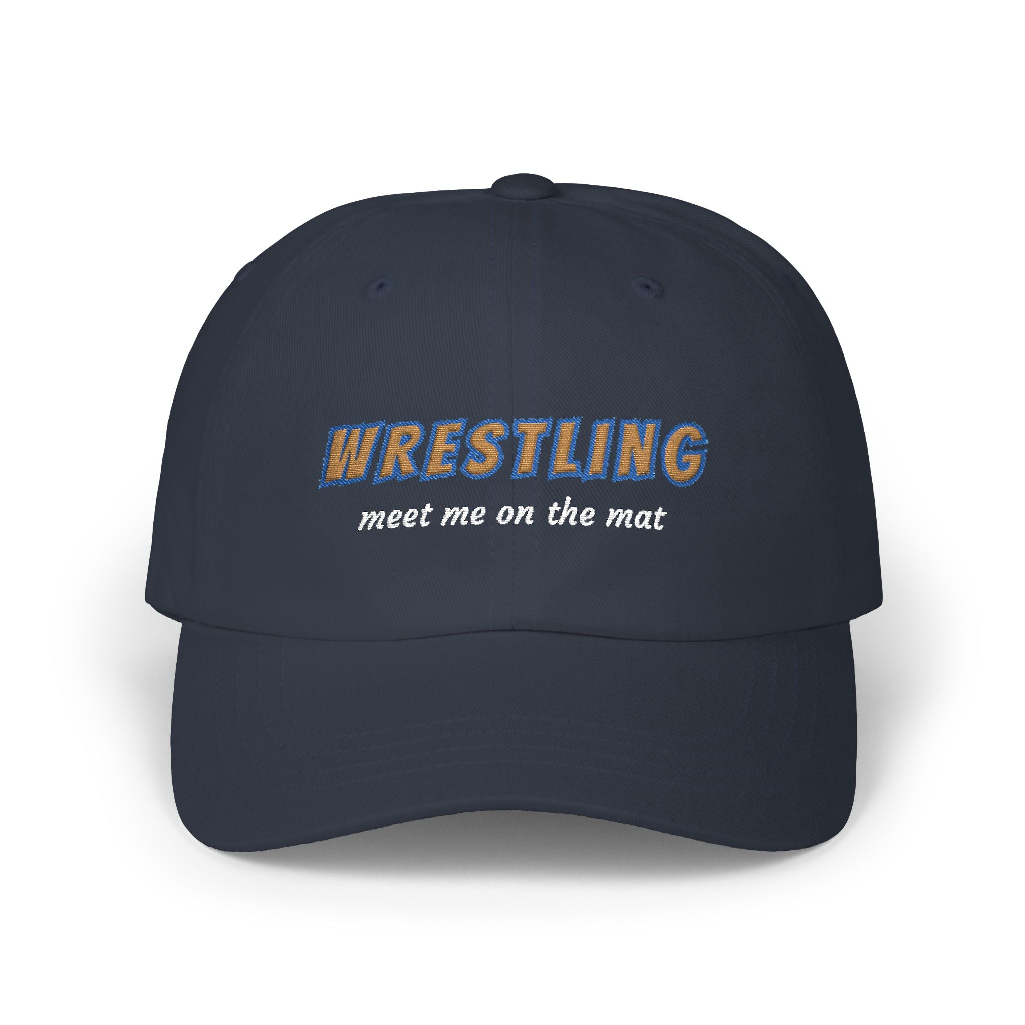 Navy cap with an embroidered Wrestling Meet Me On The Mat text.