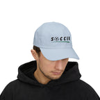 Man wearing a light blue embroidered classic dad cap hat with Soccer text and graphic