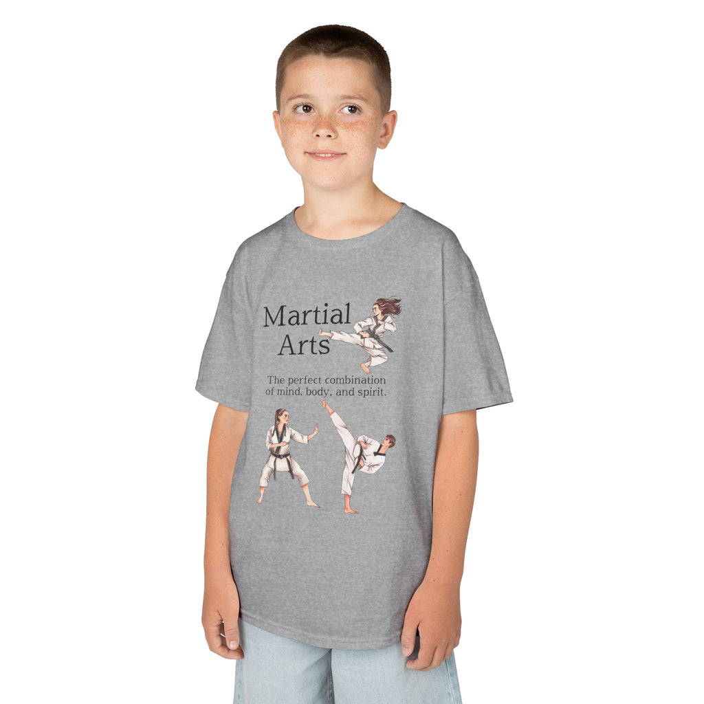 Young boy wearing a youth Gildan 5000B heavy cotton t-shirt in sport grey with a Martial Arts text and graphic