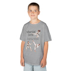 Young boy wearing a youth Gildan 5000B heavy cotton t-shirt in sport grey with a Martial Arts text and graphic