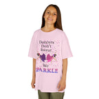 Young girl wearing a youth Gildan 5000B heavy cotton t-shirt in light pink with a Dancer's Don't Sweat We Sparkle text and graphic