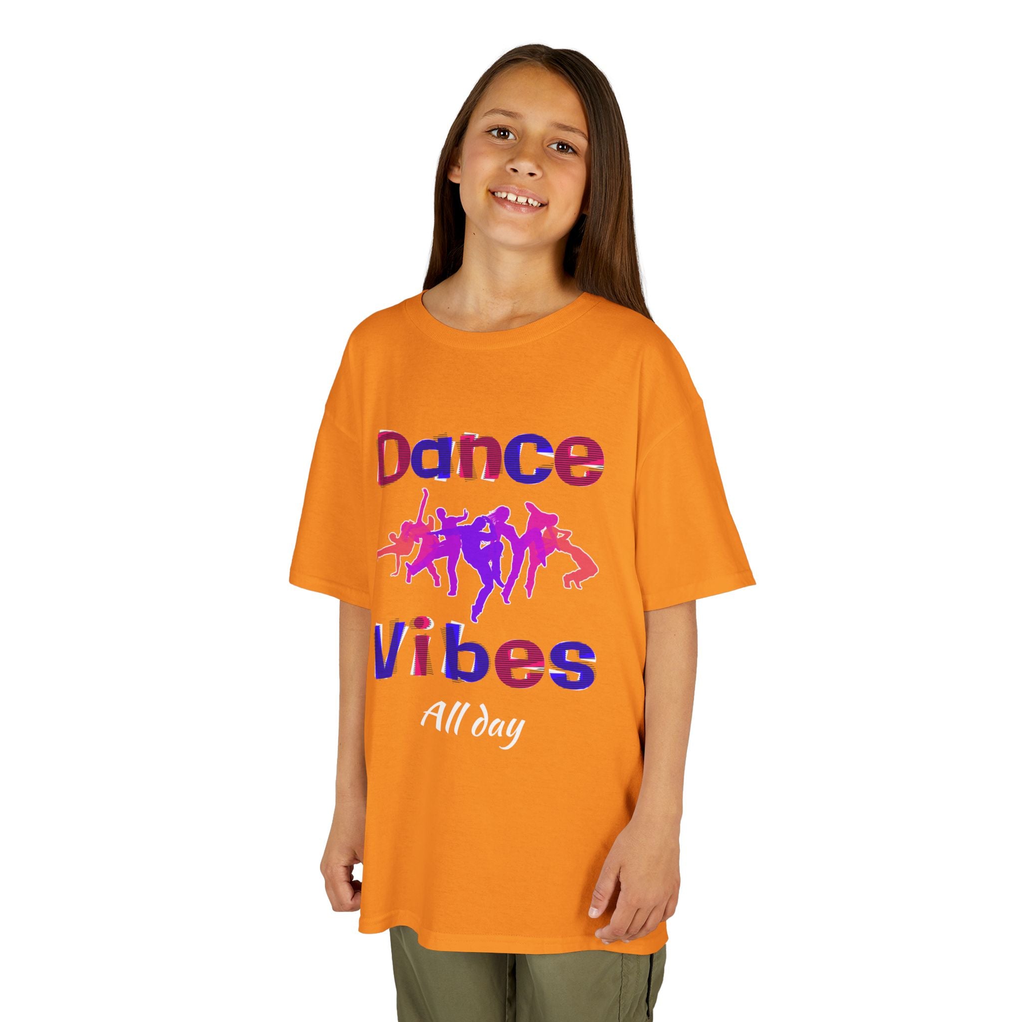 Young girl wearing a youth Gildan 5000B heavy cotton t-shirt in tennessee orange with a Dance Vibes All Day text and graphic