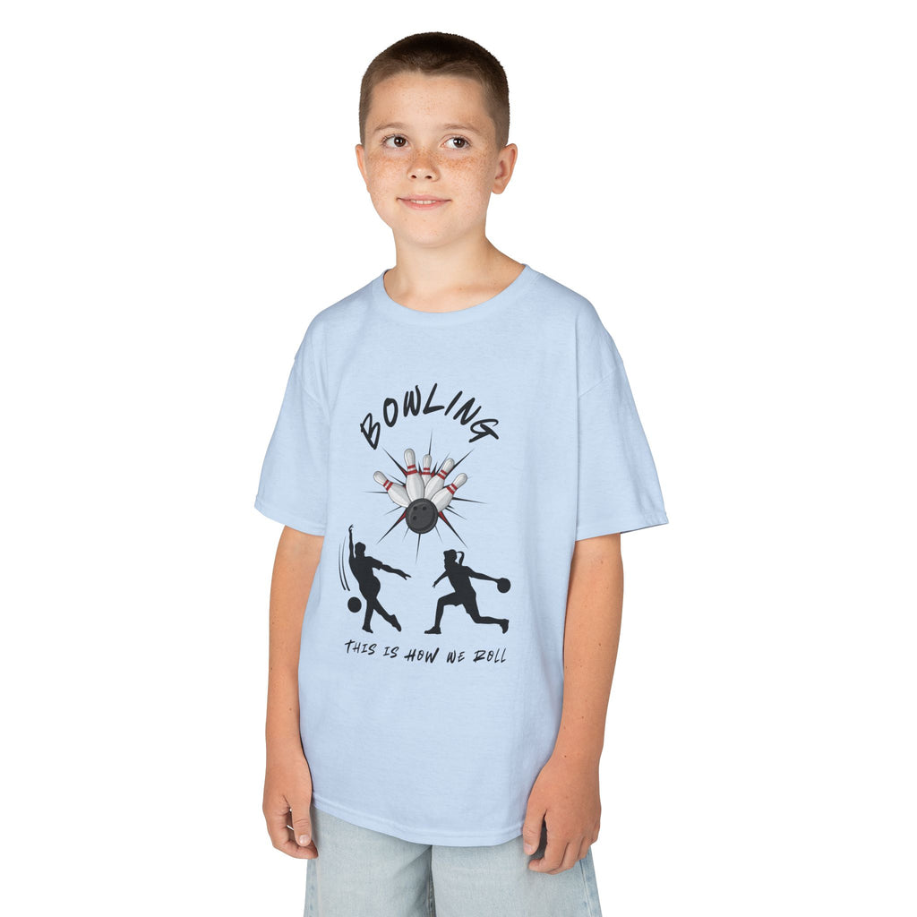 Young boy wearing a youth Gildan 5000B heavy cotton t-shirt in light blue with a Bowling text and graphic
