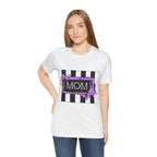 Woman wearing a Beetlejuice inspired Halloween MOM shirt in white.
