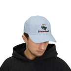 Man wearing a light blue embroidered classic dad cap hat with an It's Showtime text and graphic 