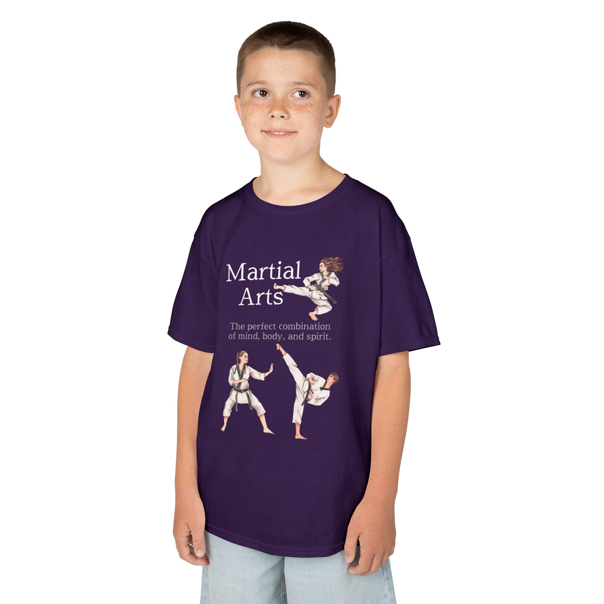 Young boy wearing a youth Gildan 5000B heavy cotton t-shirt in purple with a Martial Arts text and graphic